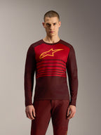 Bordeauxrode A-Dura Elite Jersey 2.0 met lange mouwen, horizontale strepen en geel Alpinestars-logo voor MTB.
