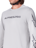 Alpinestars A-Dura Switch Jersey - Long Sleeve, Light Gray mountain bike jersey with dark gray wordmark on the chest and star logo on the sleeve, breathable jacquard texture, performance cycling gear for trail riding
