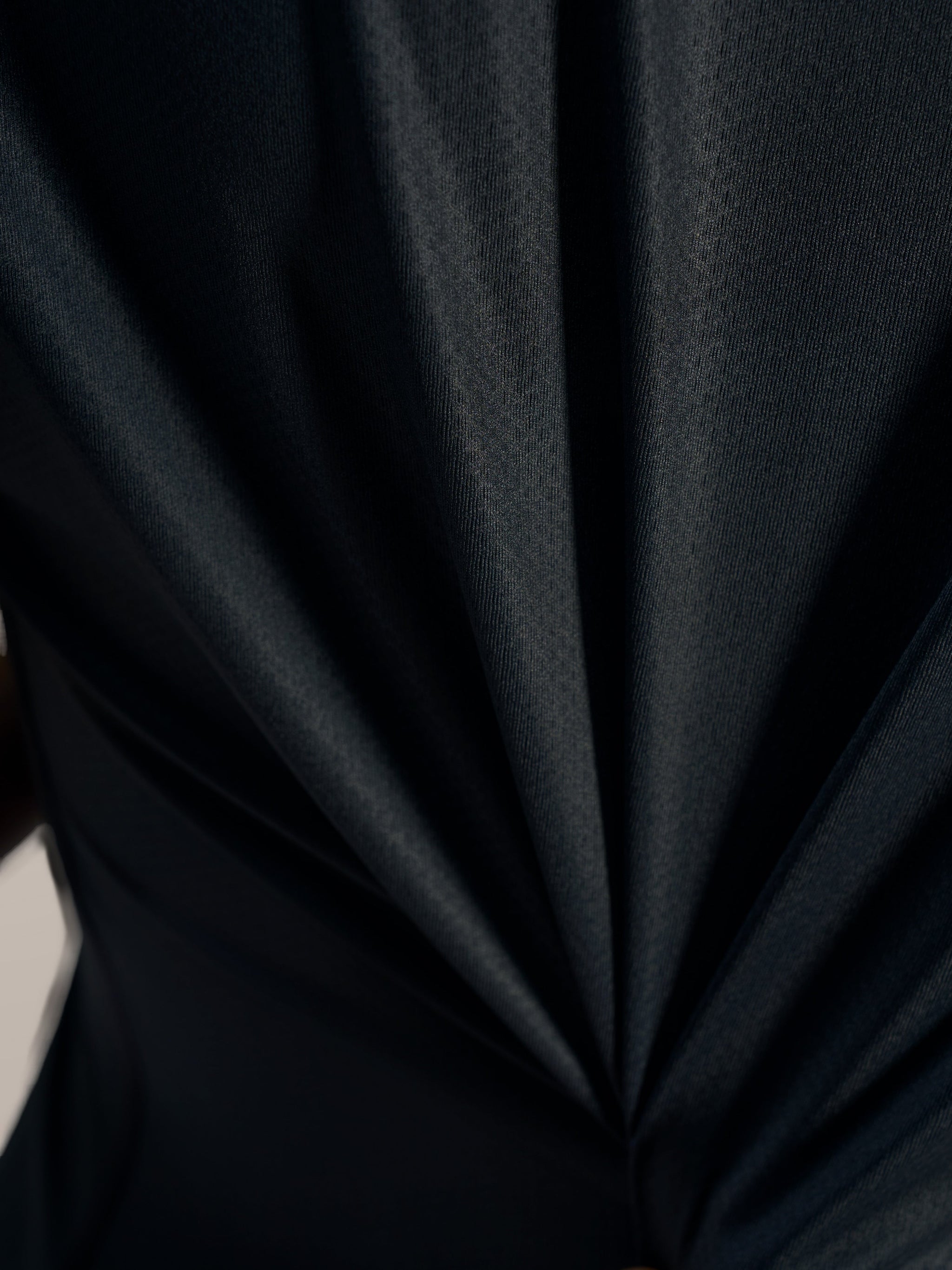Zwart jacquard detail van de Stella A-Dura Ride MTB Jersey, toont de flexibele en ademende prestatietextuur.