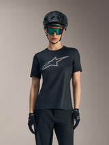 Zwarte Stella A-Dura Ride jersey voor dames met grijs logo, mountainbikehelm en goggle voor MTB.