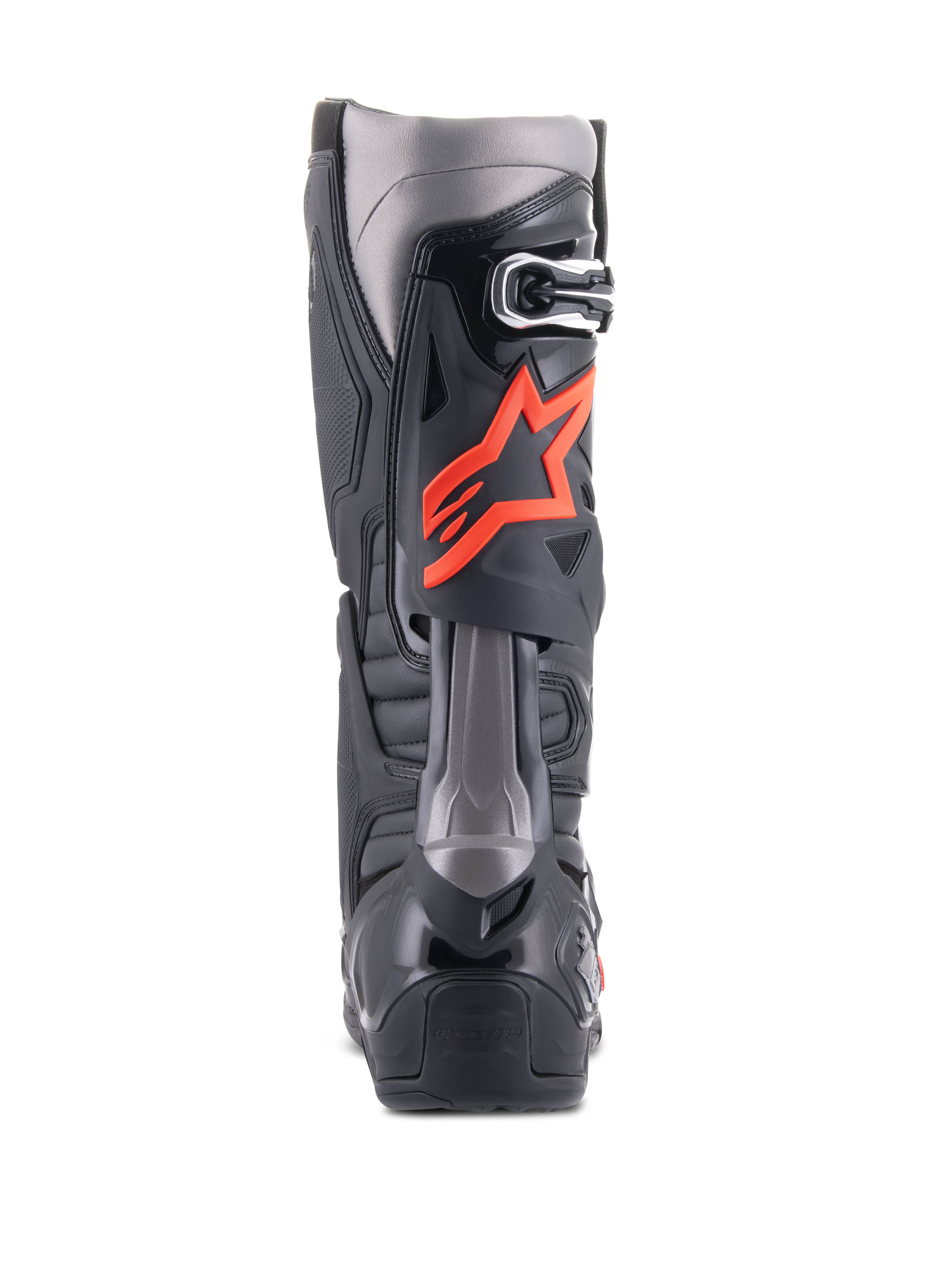 Alpinestars Tech 10 laarzen, motorcrosslaarzen, zwart en fluorood, achteraanzicht met technische TPU-schaal, donkergrijze panelen en een opvallend fluorood sterlogo op de kuit.