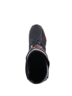 Alpinestars Tech 10 laarzen, motorcrosslaarzen, zwart en rood fluo, bovenaanzicht met zicht in de opening van de laars, voorzien van een gestroomlijnde zwarte schaal met rode accenten en een getextureerd teengedeelte