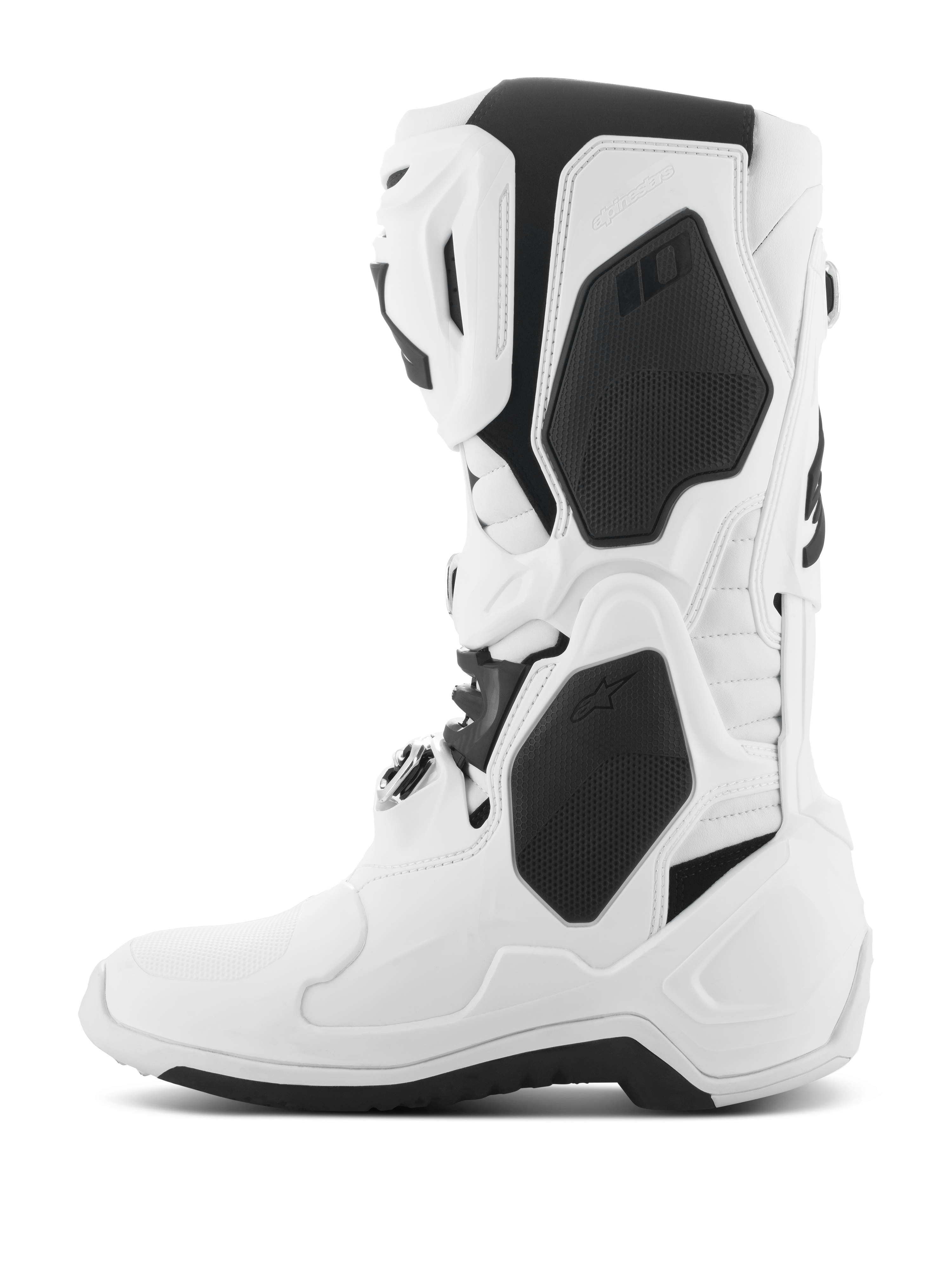 Alpinestars Tech 10 laarzen, motorcrosslaarzen, wit met zwarte accenten, zijprofiel met beschermende TPU-schalen, gespsluitingssysteem en hoogwaardig gestroomlijnd ontwerp voor off-road racen.