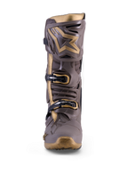Alpinestars Tech 10 Air Gold motocross boot in Earth Brown Gold with TPU armor and metallic gold accents.