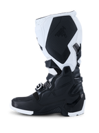 Alpinestars 2026 Tech 7 Enduro Boots, Motocross Boots, Black and White, side profile view showing durable TPU protection panels, textured medial grip section with Tech 7 branding, and heavy-duty buckle closure system for off-road riding.