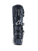 Alpinestars 2026 Tech 7 Enduro laarzen, achteraanzicht, zwart, antraciet en wit, off-road motorlaarzen met wit Astar-logo, gespsluitsysteem en TPU-hielbescherming