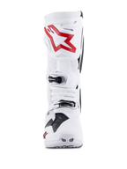 Alpinestars Tech 10 Supervented laarzen, wit en felrood, vooraanzicht met geventileerde geperforeerde panelen, groot rood sterlogo op de scheenplaat, verstelbare zilveren gespen, hoogwaardig motorcross-ontwerp