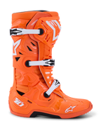 Alpinestars Tech 10 Supervented Boots, Motocross Boots, Orange Fluo and White, profile view showing white mechanical buckles and black accents, ventilated design with perforated panels, premium protective racing footwear