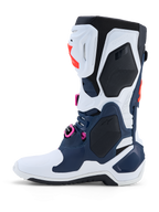 Alpinestars Tech-10 Supervented motorcrosslaarzen, donkerblauw en wit met fuchsia accenten en geventileerde TPU-schaal.