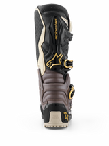 Alpinestars 2026 Tech 7 Enduro Drystar® laarzen, zwart, donkergrijs en goud, achteraanzicht met beschermende TPU-schaal, gouden gespen en Alpinestars-logo, hoogwaardig enduro-schoeisel