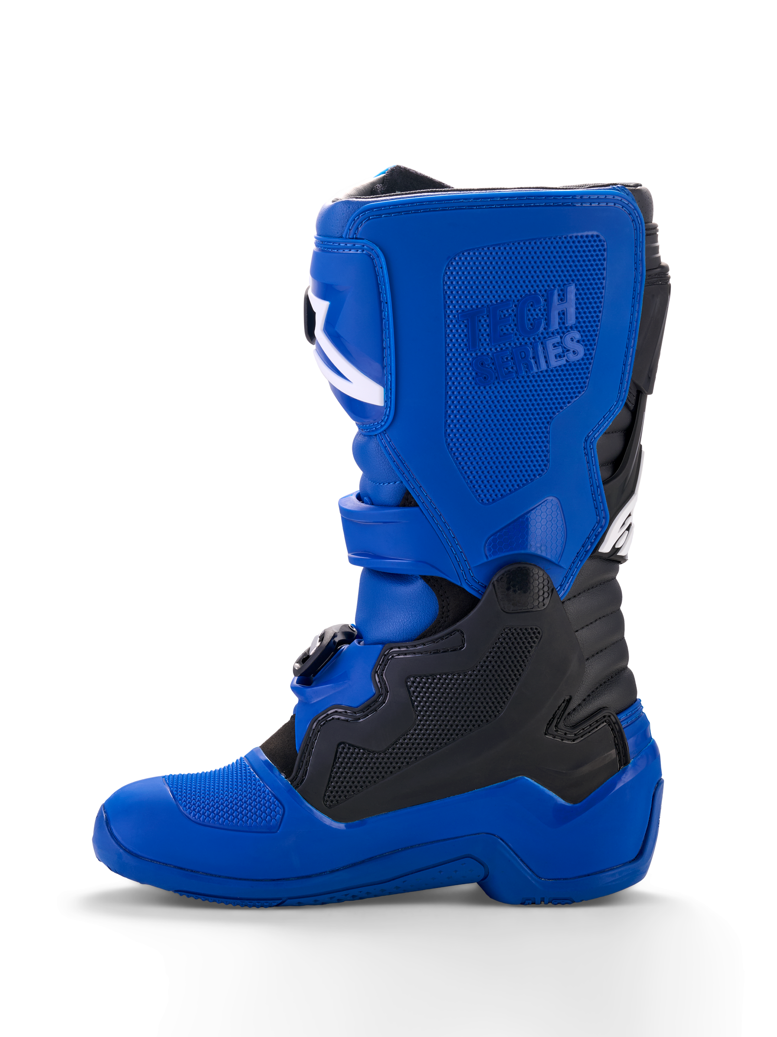 Alpinestars Yamaha Youth Tech 7S laarzen, jeugd motorcrosslaarzen, blauw met zwarte en witte accenten, zijaanzicht, met 'Tech Series' logo in reliëf, TPU-beschermingspanelen, gespsluiting en een duurzame blauwe zool voor off-road prestaties.