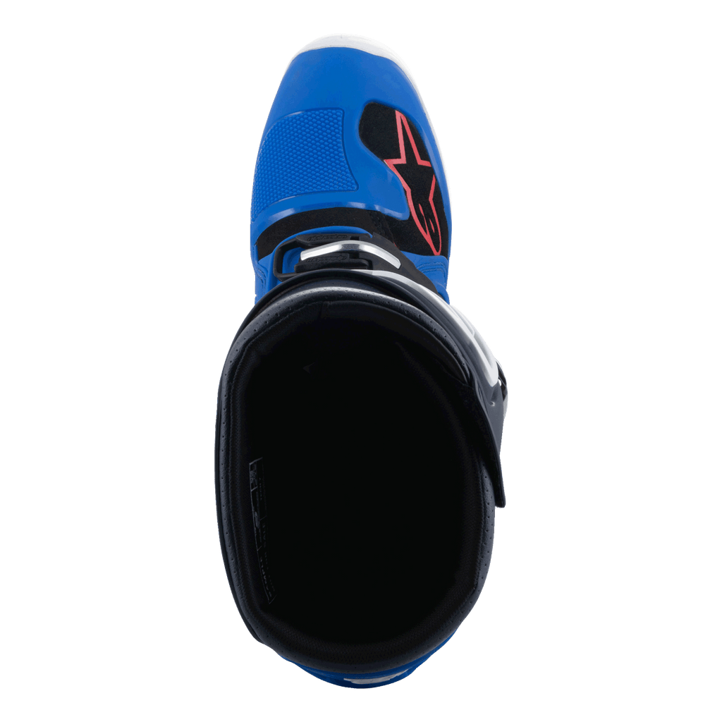 Alpinestars Tech 7 laarzen, motorcrosslaarzen, Alpine Blue Night Navy en felrood, bovenaanzicht met zicht in de binnenkant van de laars, met een blauwe neus met rood sterlogo en zwarte voering, professioneel off-road raceschoeisel