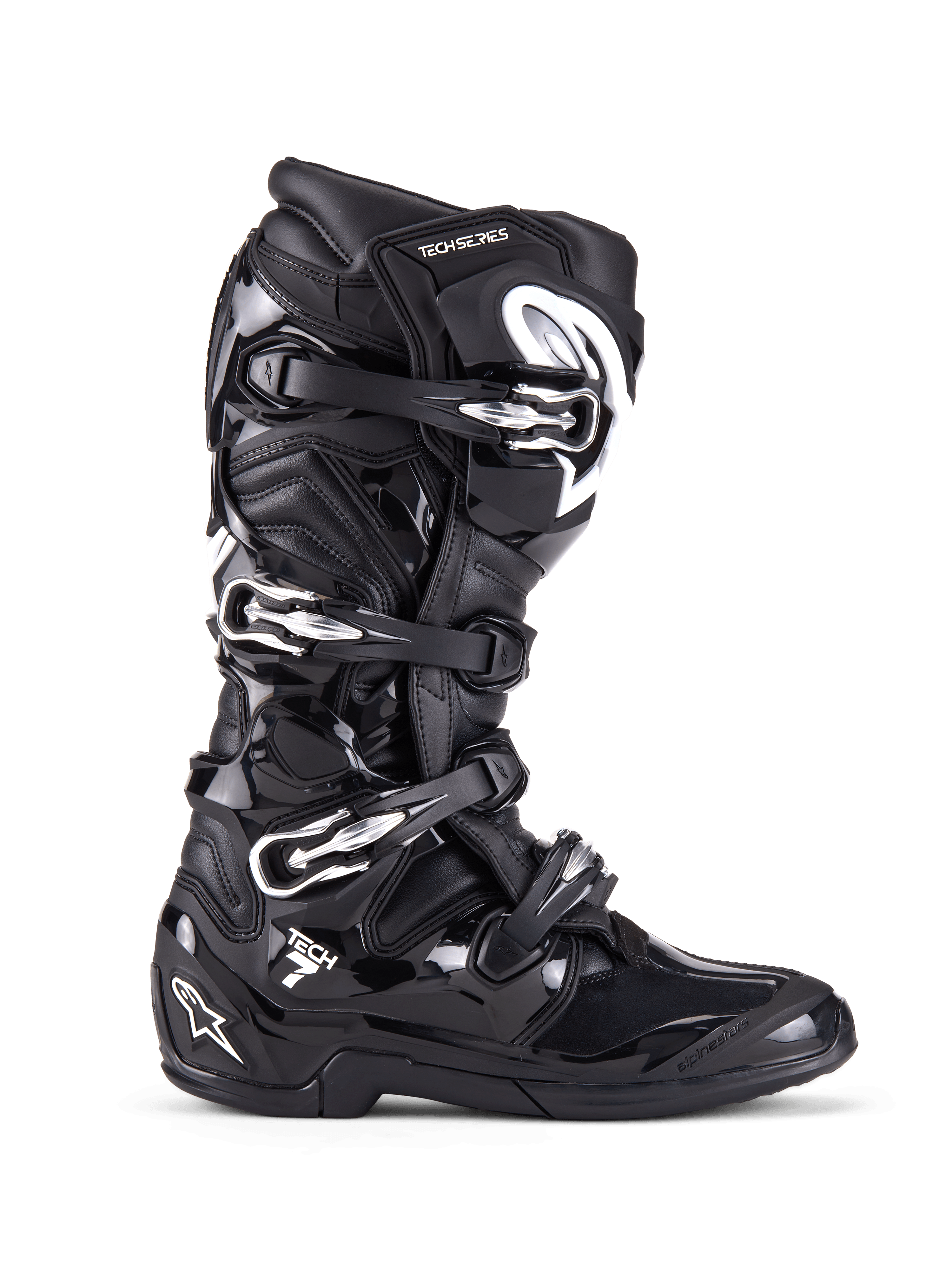Alpinestars Tech 7 laarzen, motorcross off-road laarzen, zwart met zilveren gespen en witte accenten, zijaanzicht met vier aluminium snelsluitingen, duurzame TPU-schaal en getextureerde panelen voor off-road bescherming