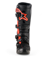 Alpinestars Tech 7 Boots, Motocross Boots, Black and Red Fluo, front view, featuring a large red fluo Alpinestars star logo on the shin plate, four-buckle closure system, and durable TPU construction designed for off-road racing.