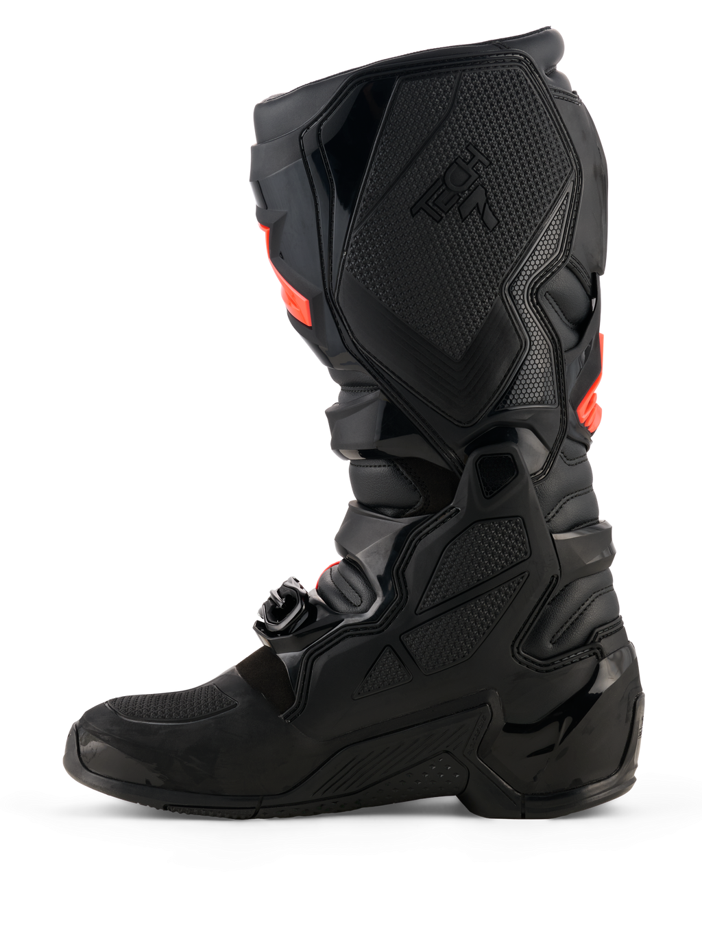 Alpinestars Tech 7 laarzen, motorcrosslaarzen, zwart met fluorode accenten, mediaal zijaanzicht met TPU beschermende schalen, gespsysteem en getextureerde grippanelen voor off-road prestaties