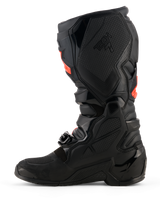Alpinestars Tech 7 Boots, Motocross Boots, Black with Red Fluo accents, medial side profile view featuring TPU protective shells, buckle system, and textured grip panels for off-road performance