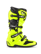Alpinestars Tech 7 laarzen, motorcrosslaarzen, fluoriserend geel en zwart, zijaanzicht met een fel neongele TPU-schaal en vier zwarte gespen, versterkte hiel en neus, scharniersysteem voor flexibiliteit en een professionele off-road race-uitstraling