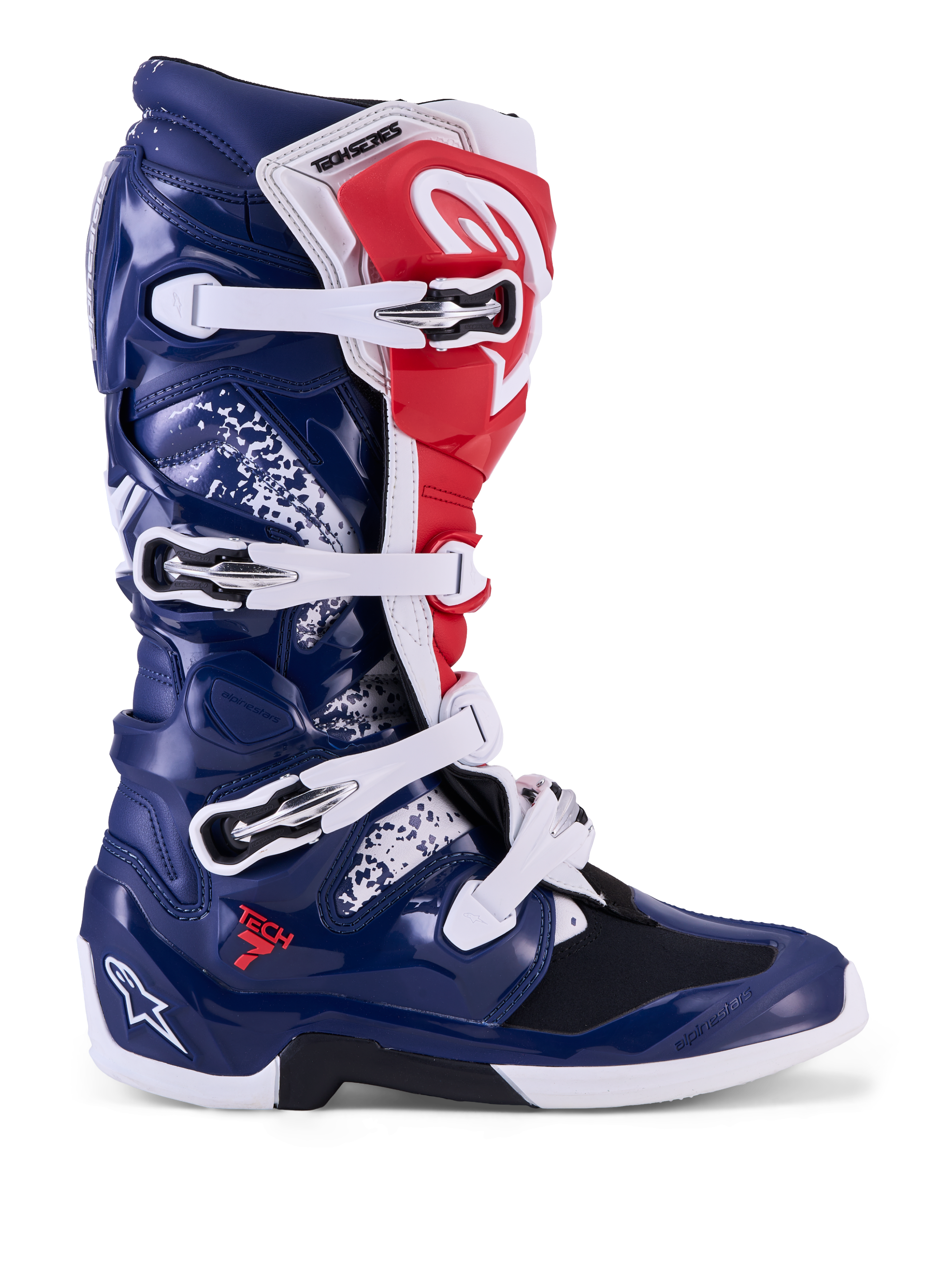 Alpinestars Tech 7 Unity motorlaarzen voor motorcross, rood, wit en blauw, beschermende TPU-schaal en gespsluiting.