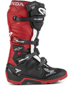Honda Tech 7 Enduro Drystar® motorlaarzen, enduro-motorlaarzen, zwart en felrood met witte accenten, voorzien van meerdere verstelbare gespen, een robuuste zool voor off-road grip, waterdichte Drystar®-technologie en prominente Honda- en Tech 7-branding
