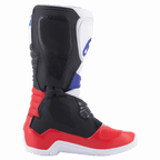 Alpinestars Tech 3 laarzen, motorcrosslaarzen, wit, helderrood en donkerblauw, zijaanzicht met focus op de TPU-scheenplaat en beschermende constructie, duurzaam synthetisch materiaal voor off-road rijden