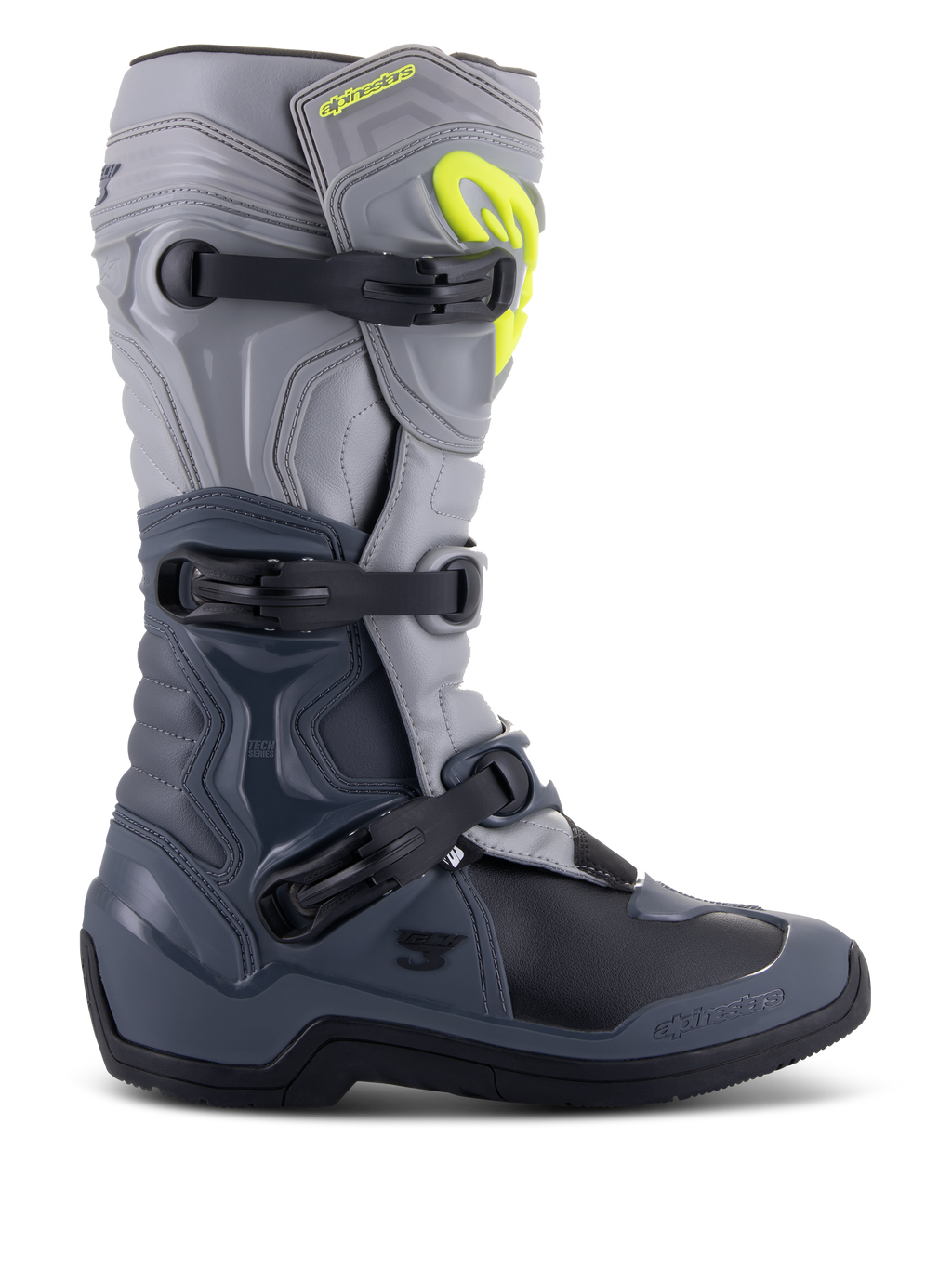 Alpinestars Tech 3 laarzen, motocrosslaarzen, donkergrijs, lichtgrijs en zwart, zijaanzicht met drie zwarte polymeer gespen, TPU-beschermingspanelen en een felgeel Alpinestars-logo op de bovenzijde van het scheenbeen