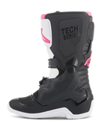 Alpinestars Stella Tech 3 dameslaarzen, motorcrosslaarzen, zwart, wit en roze, zijaanzicht met beschermende TPU-scheenplaat, grippanelen met textuur en 'TECH SERIES'-branding voor off-road racen