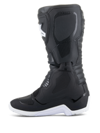 Alpinestars Tech 3 Enduro Waterproof laarzen, motorcross- en enduro-laarzen, zwart en wit, zijprofielaanzicht met getextureerde beschermende panelen, witte robuuste zool en waterdicht synthetisch bovenwerk voor off-road rijden