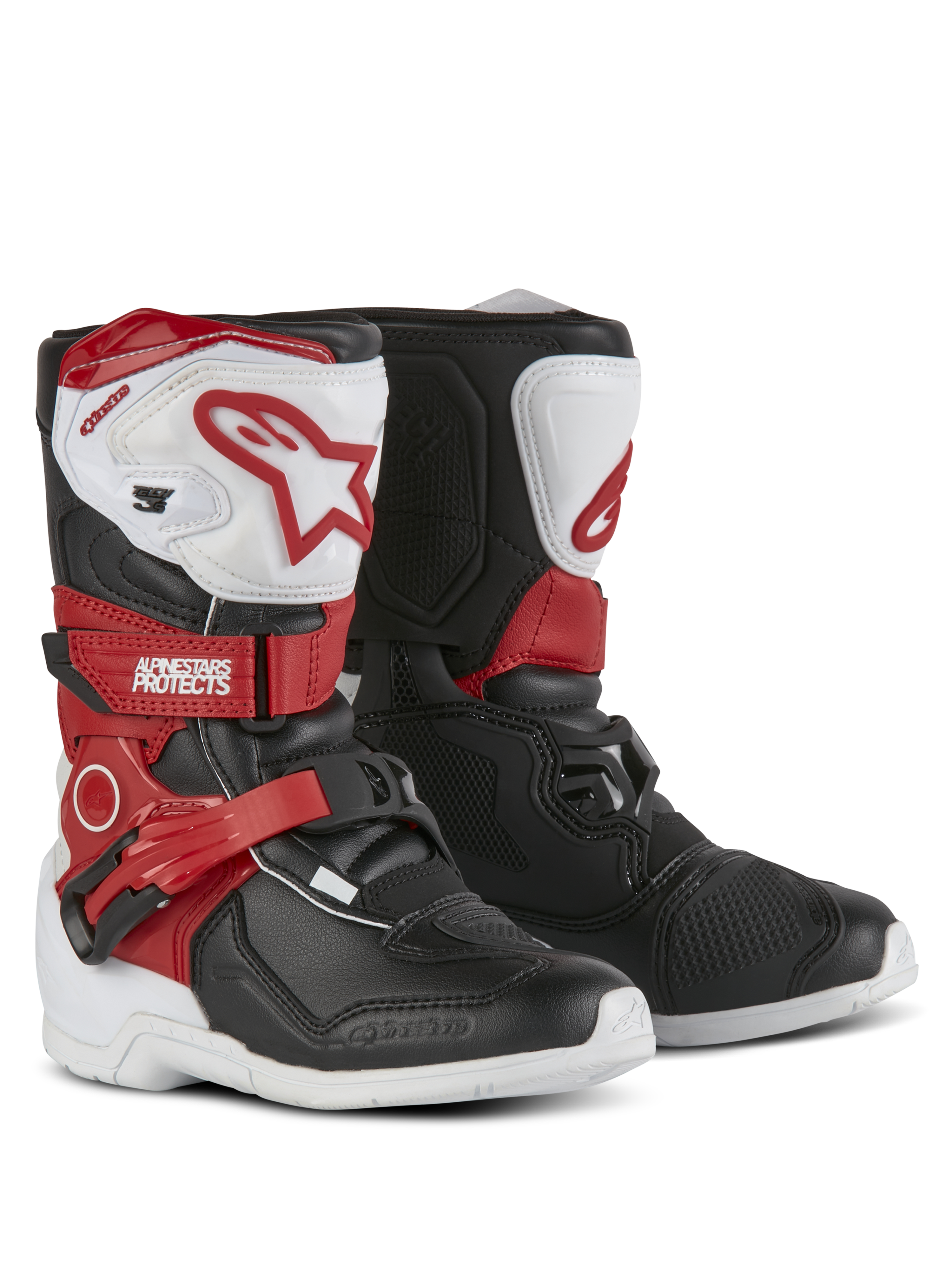 Alpinestars Kids Tech 3S laarzen, motorcrosslaarzen, wit, zwart en felrood, met beschermende TPU-scheenplaten, rode bandjes met Alpinestars-branding, gespsluiting en duurzame witte buitenzolen.