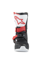 Alpinestars Kids Tech 3S laarzen, motorcrosslaarzen, wit, zwart en helderrood, vooraanzicht met witte scheenplaat en rood logo, zwart chassis met rode gespriemen, beschermend off-road schoeisel voor jonge rijders