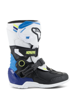 Alpinestars Kids Tech 3S motorlaarzen, jeugd motorcrosslaarzen, wit en zwart met blauwe en gele accenten, zijaanzicht met beschermende gespen en een robuuste zool, off-road raceschoeisel