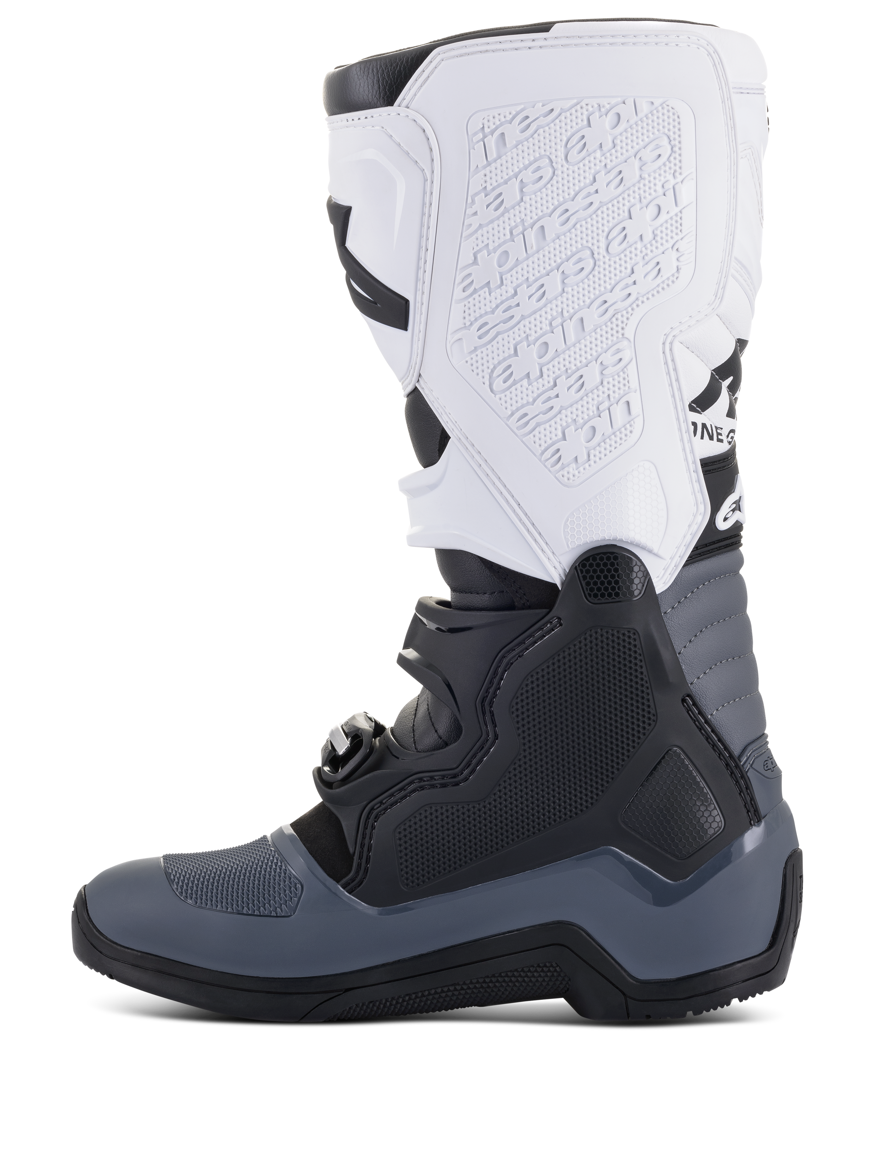 Alpinestars Tech 5 laarzen, motorcrosslaarzen, zwart, donkergrijs en wit, zijprofiel met meerdere gespsluitingen, logo in reliëf op de witte scheenplaat en duurzame constructie voor off-road prestaties