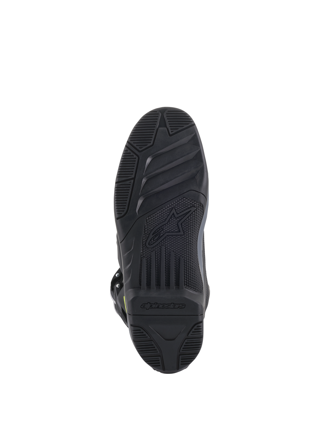 Alpinestars Tech 5 laarzen, onderaanzicht van de zool, zwart, gedetailleerd getextureerd profielpatroon voor off-road grip, voorzien van Alpinestars-logo en stersymbool in reliëf, duurzame constructie voor motorcross.