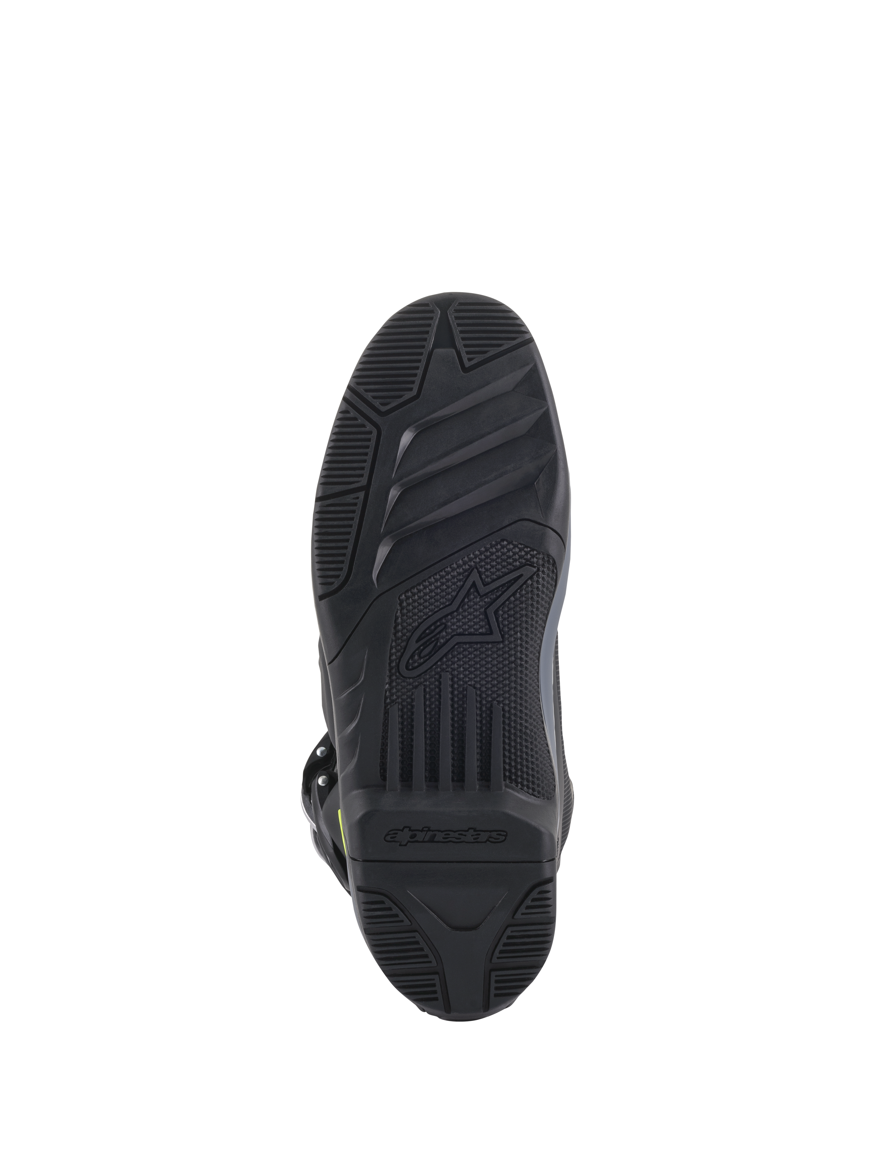 Alpinestars Tech 5 laarzen, onderaanzicht van de zool, zwart, gedetailleerd getextureerd profielpatroon voor off-road grip, voorzien van Alpinestars-logo en stersymbool in reliëf, duurzame constructie voor motorcross.