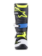 Alpinestars Youth Tech 7S laarzen, motocrosslaarzen, zwart, Enamel Blue en fluorescerend geel, vooraanzicht met een duurzaam sluitsysteem met meerdere gespen, witte teenbeschermer en opvallend fluorescerend geel Alpinestars-logo op de scheenplaat