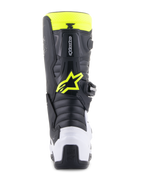 Alpinestars Youth Tech 7S laarzen, motorcrosslaarzen, zwart, wit en geel fluo, achteraanzicht met een witte hielbeschermer en neongeel Alpinestars-logo, duurzaam off-road schoeisel voor junior rijders