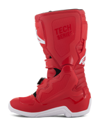 Alpinestars Youth Tech 7S laarzen, jeugd motorcrosslaarzen, rood, voorzien van een witte zool, TPU-versterkte panelen, meerdere gespsluitingen en 'TECH SERIES' branding, ontworpen voor junior off-road rijders