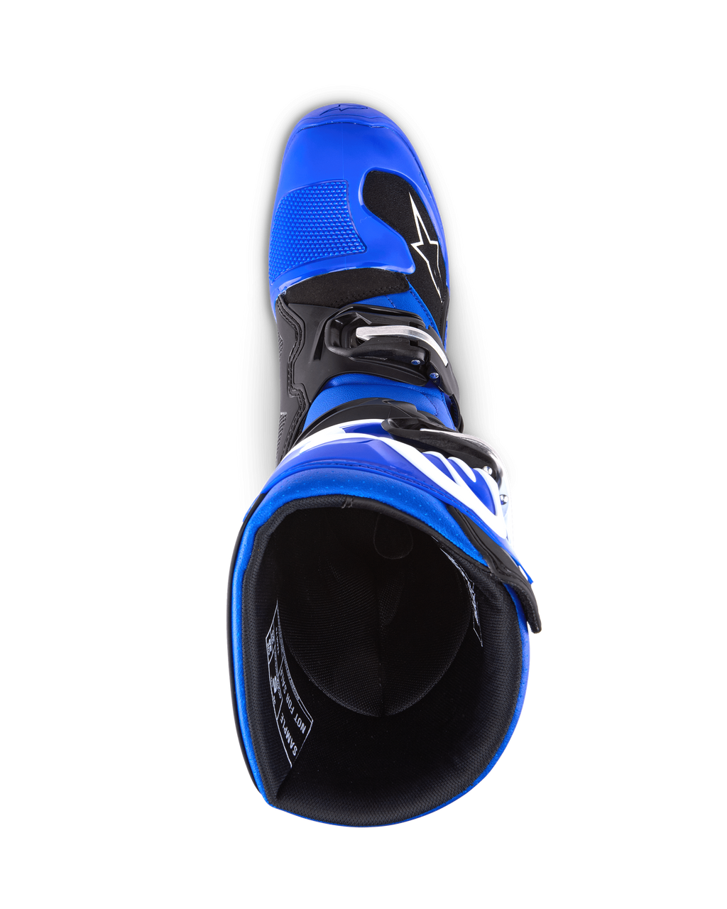 Alpinestars Youth Tech 7 S laarzen, motorcrosslaarzen, blauw, zwart en wit, bovenaanzicht met inkijk in de binnenkant van de laars, toont blauwe buitenzijde en zwarte voering, duurzame constructie met witte branding voor jeugd motorcross racing