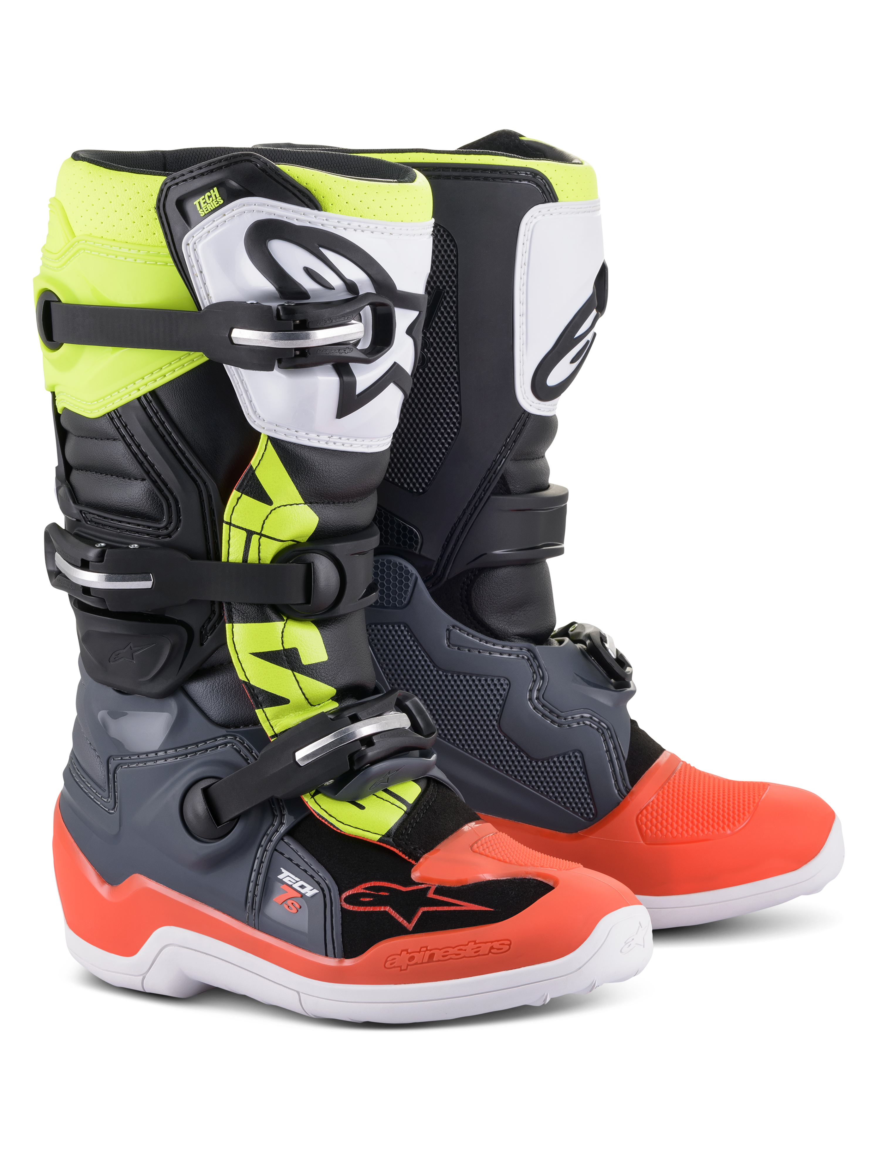 Alpinestars Youth Tech 7S laarzen, motorcrosslaarzen, donkergrijs met rode en fluorgele accenten, voorzien van een witte TPU-scheenplaat met zwart logo, drievoudig gespsluitingssysteem en een duurzame witte zool, ontworpen voor junior off-road rijders.