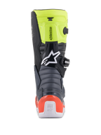 Alpinestars Youth Tech 7S laarzen, jeugd motocrosslaarzen, donkergrijs, fluorescerend rood en fluorescerend geel, achteraanzicht met accordeon flexzones, rode hielbeschermer en wit Alpinestars-logo