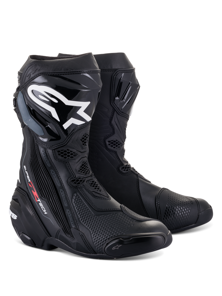 Alpinestars Supertech R Boots, high-performance racing motorcycle boots, Black, featuring a prominent white Astar logo on the shin plate, red Supertech R branding, and advanced TPU protective panels with technical mesh textures.