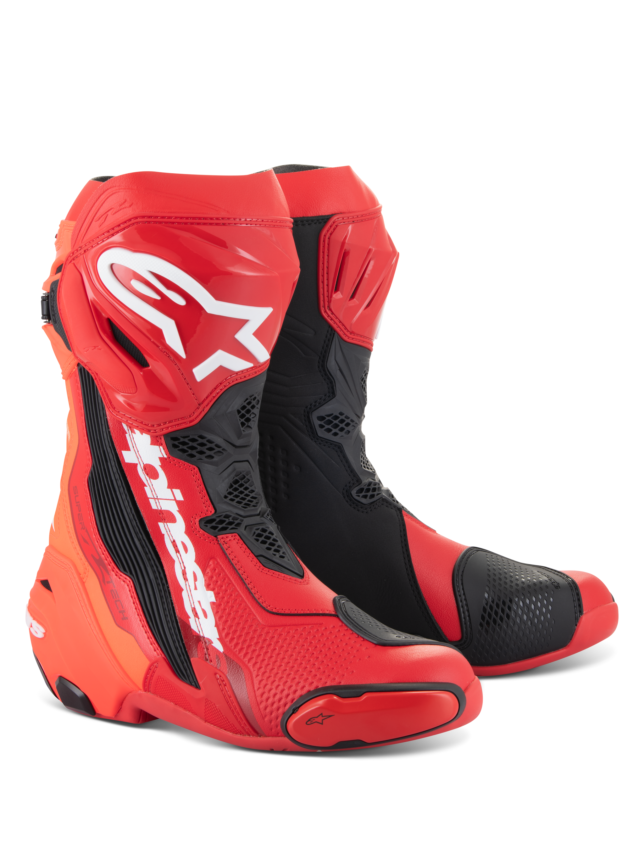 Alpinestars Supertech R laarzen, motorrace-laarzen, helderrood en fluo rood met zwarte en witte accenten, voorzien van witte Alpinestars-logo's op de scheenplaat, verstevigde beschermplaten en vervangbare teensliders, hoogwaardig schoeisel voor sport en racen.