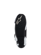Zool van Alpinestars Supertech R Vented laarzen, zwarte lichtgewicht rubberen buitenzool met getextureerd profiel voor grip op de voetsteunen, wit Alpinestars Astar-logo, wit en zwart kleurenschema