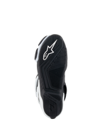 Alpinestars Stella SMX-6 V3 Drystar® laarzen, motorlaarzen voor dames, wit en zwart, zoolaanzicht met een zwarte rubberen buitenzool met een getextureerd grippatroon, geïntegreerd wit Alpinestars sterlogo en merknaam op de hiel