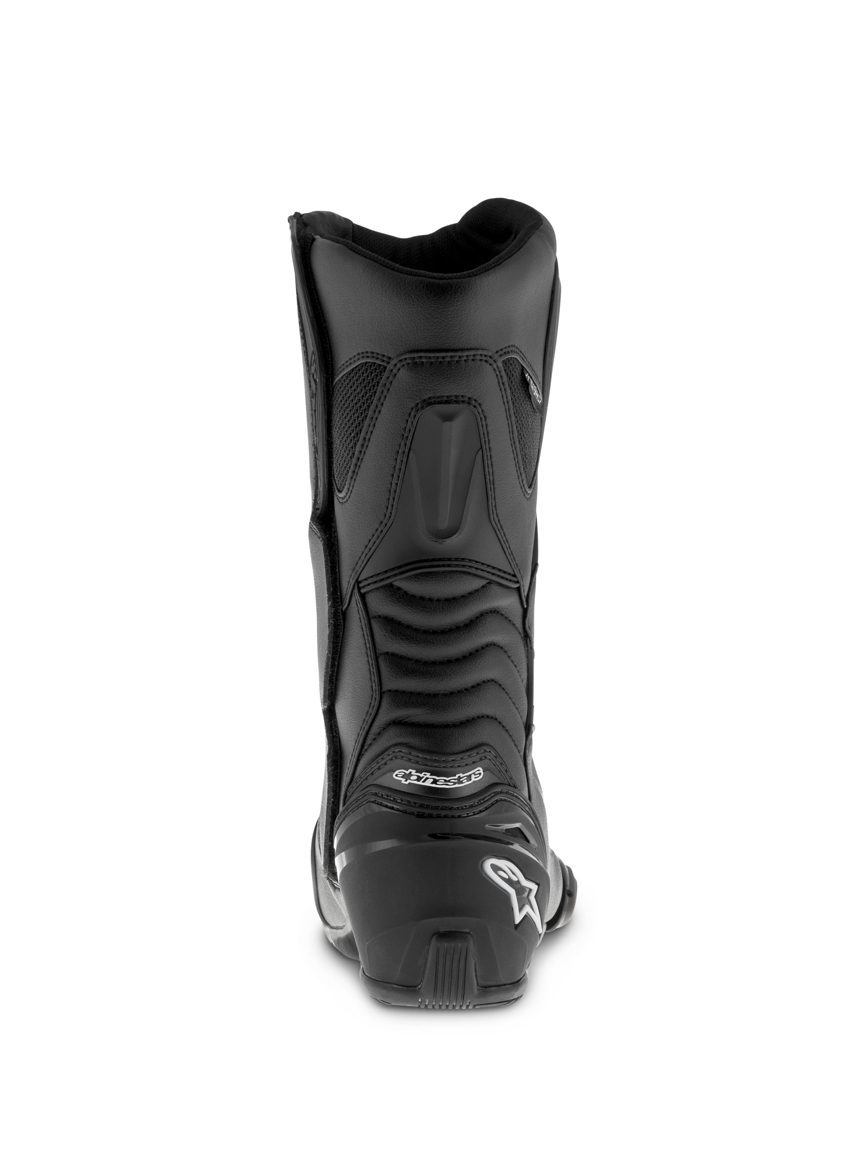 Alpinestars SMX S Waterproof laarzen, zwarte motorlaarzen, achteraanzicht met een verstevigde hielkap en wit logo, geribbelde accordeon-flexpanelen voor enkelmobiliteit, duurzame microvezelconstructie voor sport-touring.