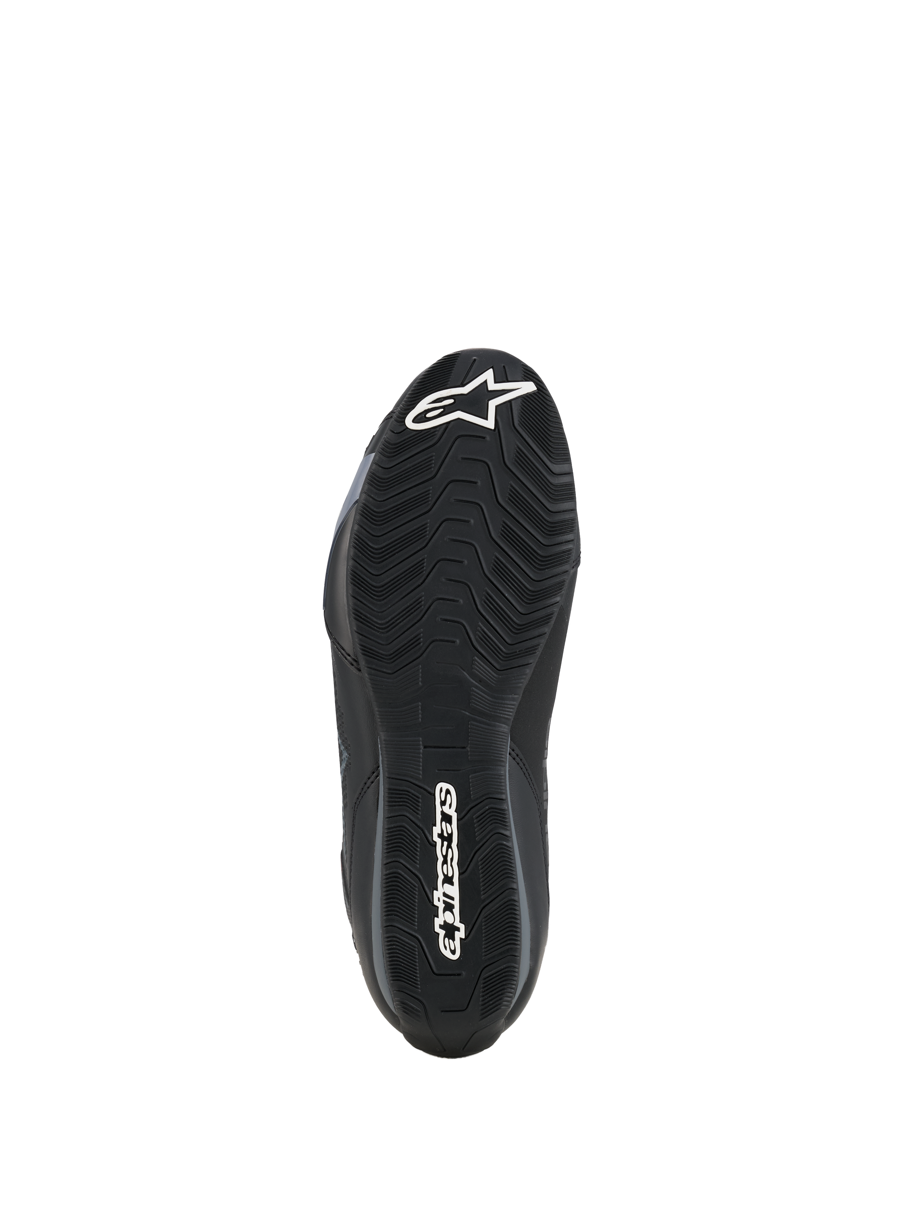 Alpinestars Celer Schoenen, onderkant van de zool, zwart oliebestendig rubbermengsel met getextureerd golvend grippatroon, voorzien van witte Alpinestars-branding op de neus en hiel, ontworpen voor grip op de voetsteunen van de motor