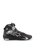 Alpinestars Celer Superair schoenen, motorschoenen, zwart en wit, zijaanzicht met witte grafische patronen en groot Astar-logo, Rotor-sluitingssysteem op de tong, TPU-enkelbescherming met 'ONE GOAL ONE VISION' branding, ademend bovenwerk van textiel voor prestaties bij warm weer