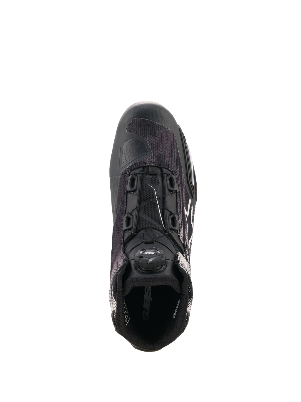 Alpinestars Celer Superair Schoenen, zwart-witte motorschoen getoond vanuit een bovenaanzicht, voorzien van het geïntegreerde Rotor-sluitingssysteem, ademend textiel bovenwerk en sportief ontwerp voor prestaties bij warm weer.