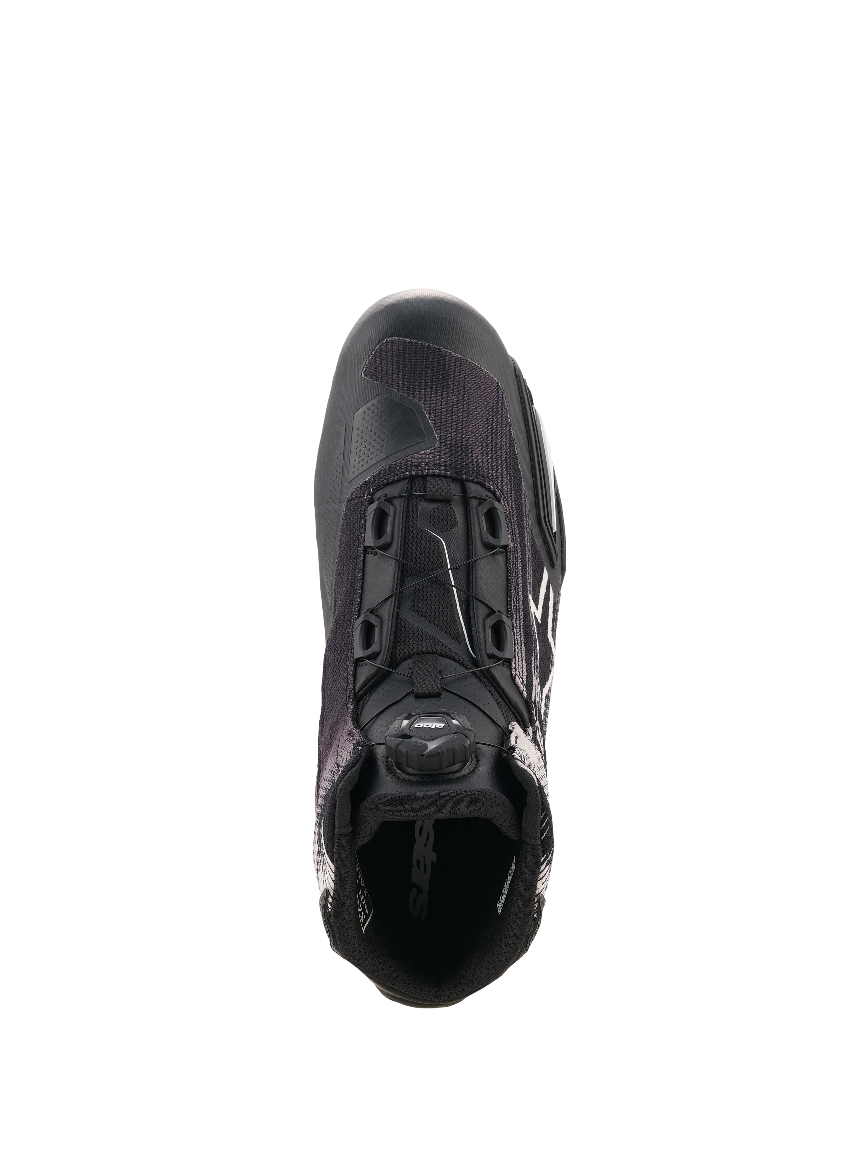Alpinestars Celer Superair Schoenen, zwart-witte motorschoen getoond vanuit een bovenaanzicht, voorzien van het geïntegreerde Rotor-sluitingssysteem, ademend textiel bovenwerk en sportief ontwerp voor prestaties bij warm weer.