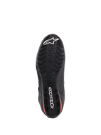 Alpinestars Faster-3 Drystar® schoenen, motorschoenen, zwart en fluorood, onderaanzicht van de zool, getextureerde rubberen buitenzool met gegolfd loopvlakprofiel, met witte Alpinestars ster en woordmerk logo's, waterdicht performance schoeisel