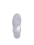 Alpinestars Stella Chrome Drystar® schoenen, dames urban motorlaarzen, wit en grijze rubberen zool met hexagonaal profiel.